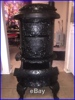 1904 P. D. Beckwith Antique Round Oak Wood Burning Cast Iron Parlor Stove