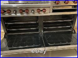60 Wolf Range-Dual Ovens, 6 Cast iron burners and griddle