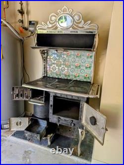 Antique Belanger Cast Iron Stove with Floral Tile Backsplash Circa 1910