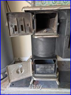 Antique Belanger Cast Iron Stove with Floral Tile Backsplash Circa 1910