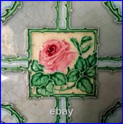 Antique Belanger Cast Iron Stove with Floral Tile Backsplash Circa 1910 Antique Belanger Cast Iron Stove with Floral Tile Backsplash Circa 1910