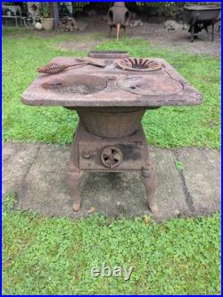 Antique CAST IRON WOOD-BURNING STOVE