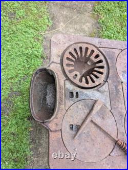 Antique CAST IRON WOOD-BURNING STOVE
