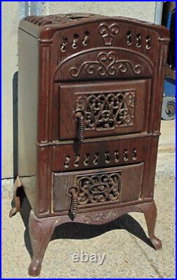Antique Cast Iron Cabinet Parlor Stove 17x13x33 1/4High (No broken parts)
