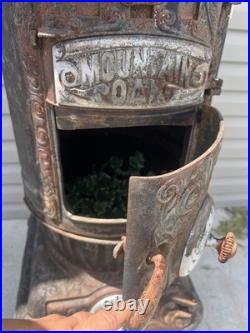 Antique Cast Iron Glenwood Oak Heating Cylinder Stove Wood Coal Burning Antique Cast Iron Glenwood Oak Heating Cylinder Stove Wood Coal Burning