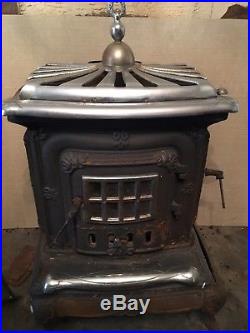 Antique Cast Iron Parlor Stove with Nickle