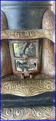 Antique Cast Iron Victorian Stove Rare Art Laurel Number 10 Wooden Wheels