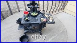 Antique Crescent cast iron large fancy toy stove witha bunch of mini accessories Antique Crescent cast iron large fancy toy stove witha bunch of mini accessories