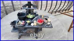 Antique Crescent cast iron large fancy toy stove witha bunch of mini accessories Antique Crescent cast iron large fancy toy stove witha bunch of mini accessories