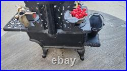 Antique Crescent cast iron large fancy toy stove witha bunch of mini accessories Antique Crescent cast iron large fancy toy stove witha bunch of mini accessories