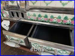 Antique French cast iron and tile stove