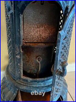 Antique French cast-iron stove, cast-iron enameled tall round stove, circa 1910