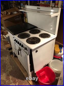 Antique Landers Fray & Clark, Universal Wood & Electric Stove