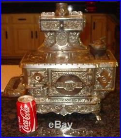Antique Nickel cast iron toy cook stove J&E Stevens-15482