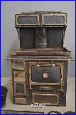 Antique Old Fashioned Cast Iron Monarch Malleable Wood or Coal Cook Stove