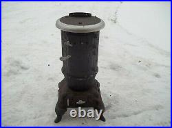 Antique Penninsular Potbelly Parlor wood stove