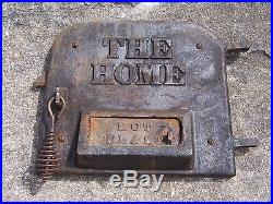 Antique The Home Wood Stove Door Panel Cast Iron Parlor Pot Belly Sign