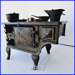 Antique Toy Stove/Sample Baby With Pots Ideal Manufacturing Co. Cast Iron Range