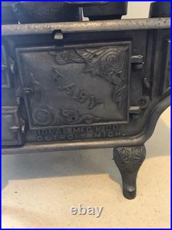 Antique Toy Stove/Sample Baby With Pots Ideal Manufacturing Co. Cast Iron Range Antique Toy Stove/Sample Baby With Pots Ideal Manufacturing Co. Cast Iron Range