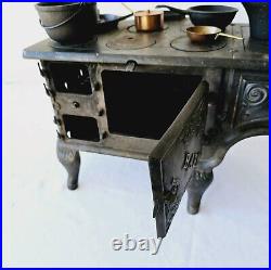 Antique Toy Stove/Sample Baby With Pots Ideal Manufacturing Co. Cast Iron Range