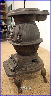 Antique W. M. Landers Hustler Cast Iron Coal Burning Pot Belly Stove