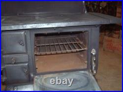 Antique Wood burning Cook Stove, 25 Depth X 58 Height X 35 wide