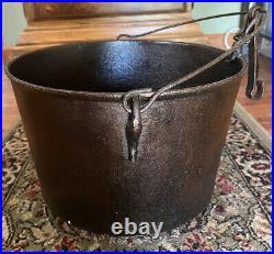 Antique cast iron 3 legged pot with stove hanger