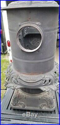 Antique cast iron S M Howes of Boston Sparkle Oak round parlor stove