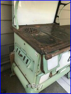 Antique cast iron kitchen stove, Montgomery Wards with 6 burners and oven