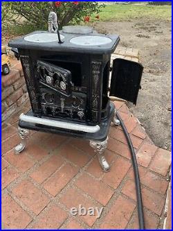Antique cast iron parlor stove