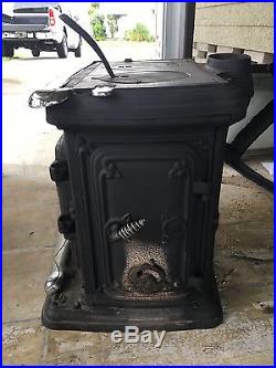 Antique cast iron pot belly stove