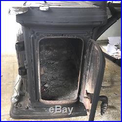 Antique cast iron pot belly stove