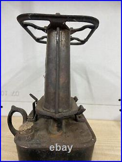 Antique cast iron sad stove