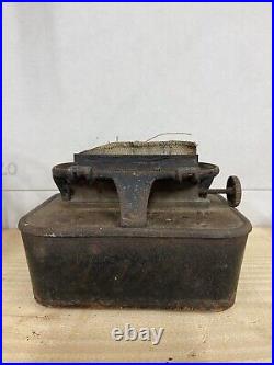 Antique cast iron sad stove