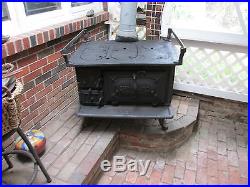 Antique cast iron stove shipmate 135