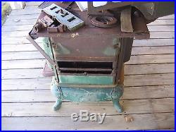 Antique cast iron woodburning cook stove