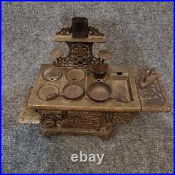 Antique eagle cast iron toy stove