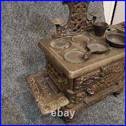 Antique eagle cast iron toy stove