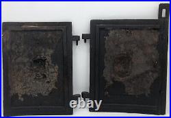 Antique pair of french stove doors 19th century cast iron furniture