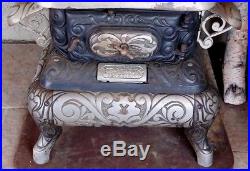 Antique wood burning cast iron Parlor Stove Keeley Co Pa. Model Columbian Joy