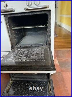 Beautiful vintage white O'Keefe and Merritt oven with griddle. 34x46x26