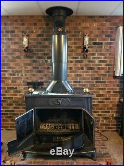CAST IRON WOOD BURNING STOVE withBLOWER & CHIMNEY PIPE