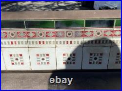 European cast iron stove with decorative tiles European cast iron stove with decorative tiles