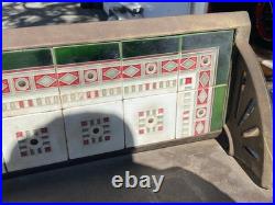 European cast iron stove with decorative tiles European cast iron stove with decorative tiles