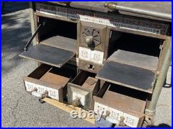 European cast iron stove with decorative tiles European cast iron stove with decorative tiles