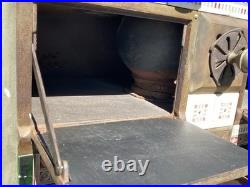 European cast iron stove with decorative tiles European cast iron stove with decorative tiles