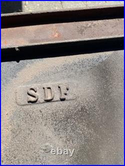 European cast iron stove with decorative tiles European cast iron stove with decorative tiles