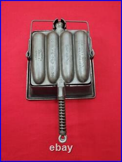 Excellent Wagner Cast Iron Krusty Korn Sausage Pan Maker Tall Base Bail Handle Excellent Wagner Cast Iron Krusty Korn Sausage Pan Maker Tall Base Bail Handle