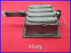 Excellent Wagner Cast Iron Krusty Korn Sausage Pan Maker Tall Base Bail Handle Excellent Wagner Cast Iron Krusty Korn Sausage Pan Maker Tall Base Bail Handle