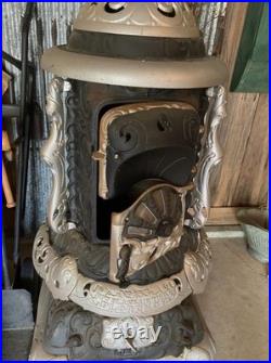Florence 153 Antique Cast Iron Parlor Stove. Fair Condition